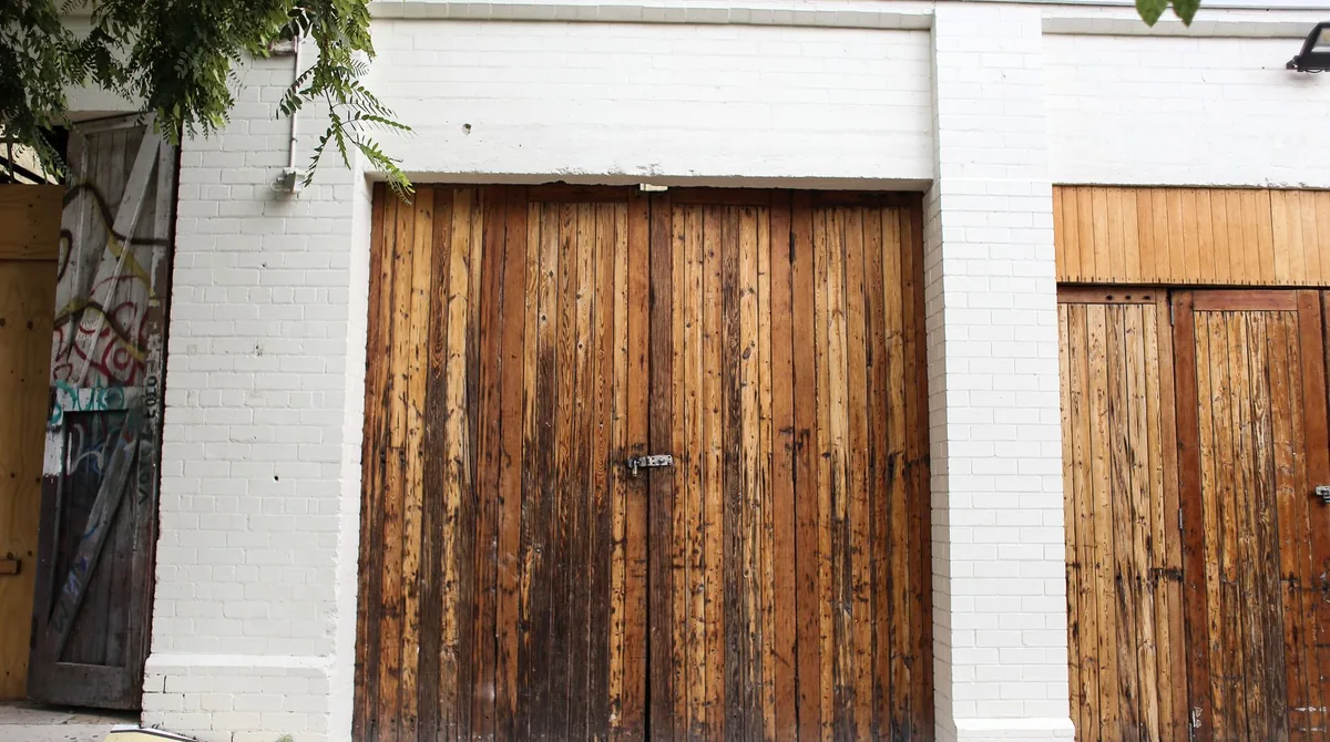 Motor horsepower and lifting force ratings matched to door construction and weight