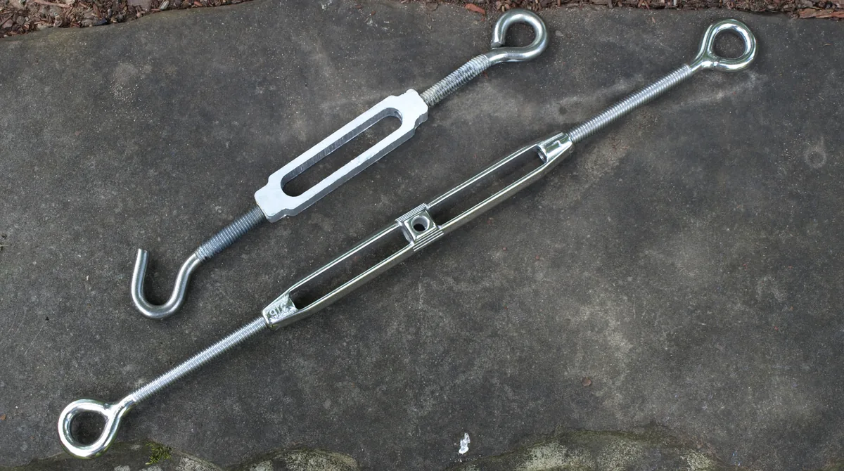 Checking chain sag clearance and adjusting trolley turnbuckle tension nut