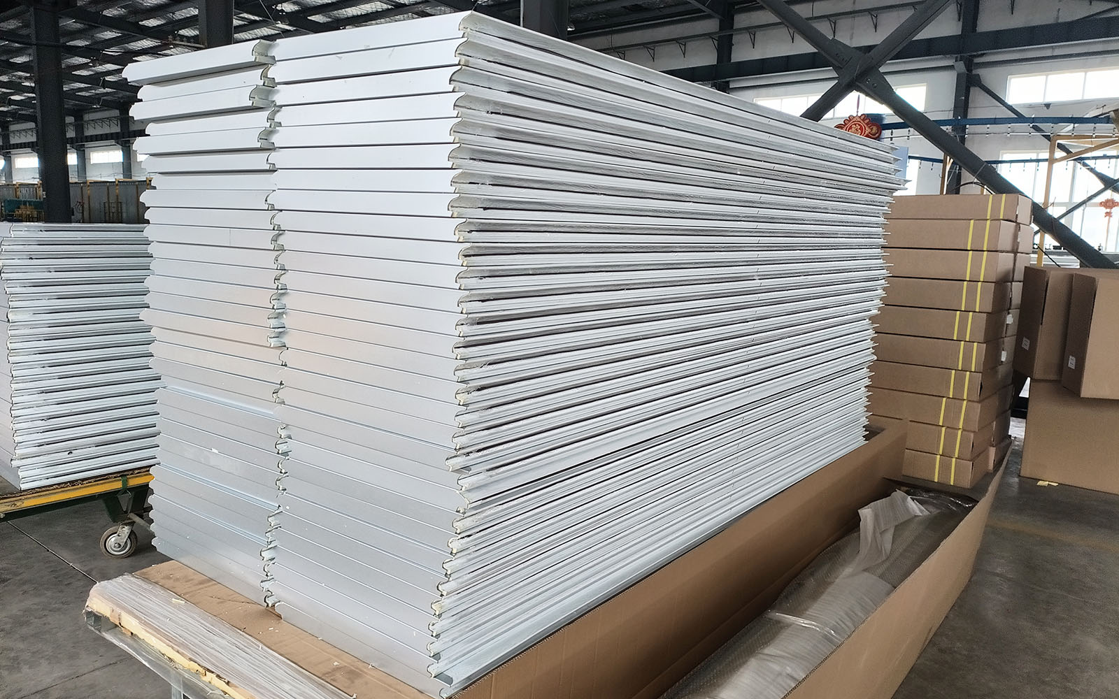 Insulated door panels curing in-house