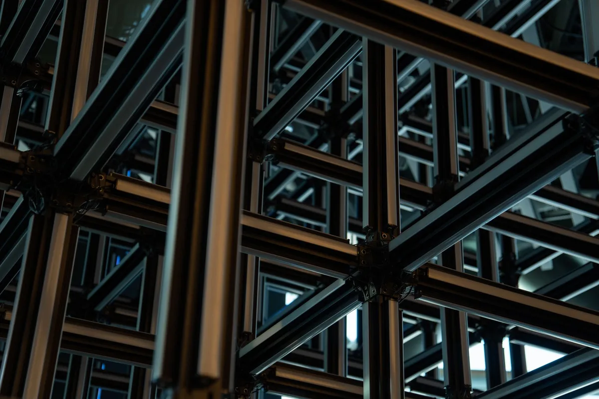Two-piece clamp frame engineered for flush modular sandwich panel integration (source: Raxdoors engineering)